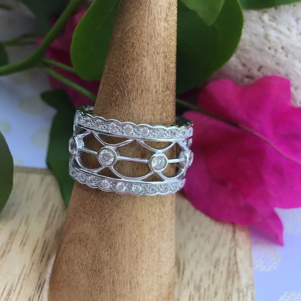 Wide sterling silver CZ cage ring 8