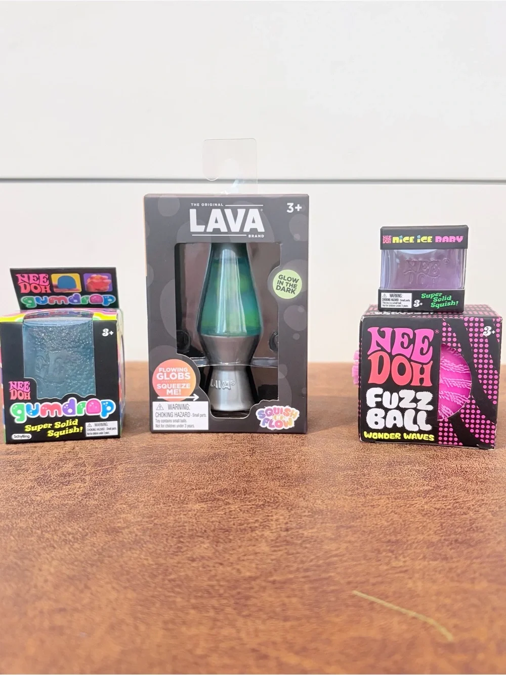 NIB NeeDoh Squishy Toy Bundle Lava Lamp Gumdrop Fuzz Ball Ice Baby 4pc