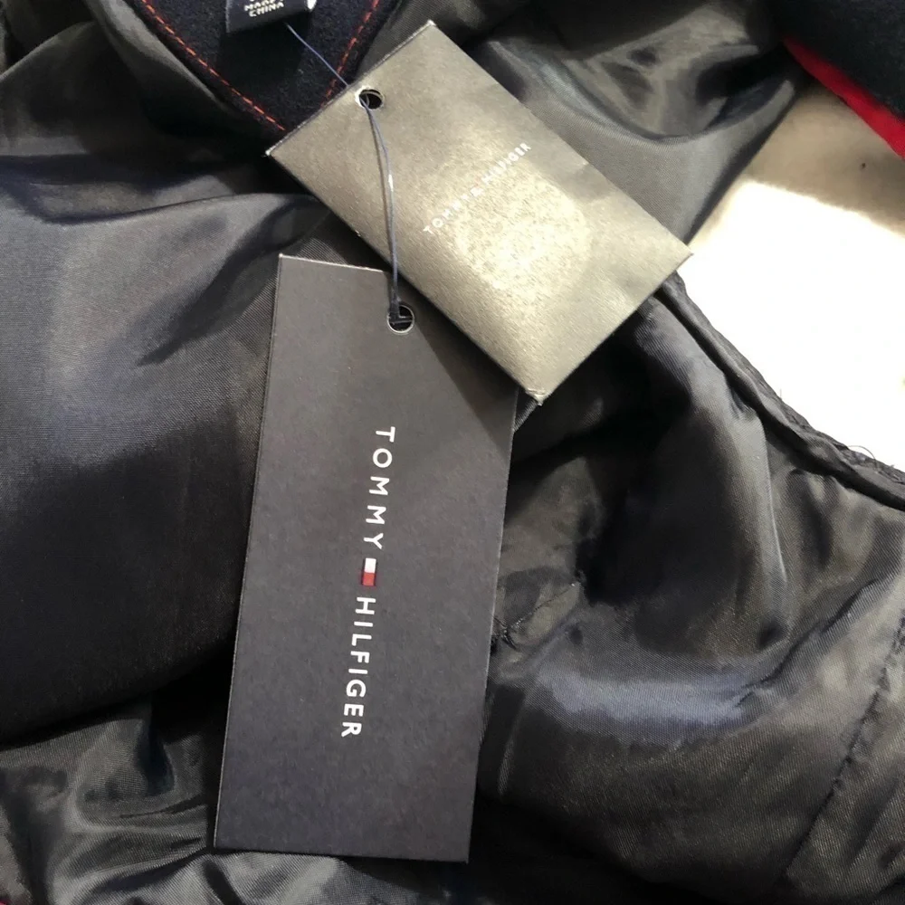 Tommy Hilfiger buttons up