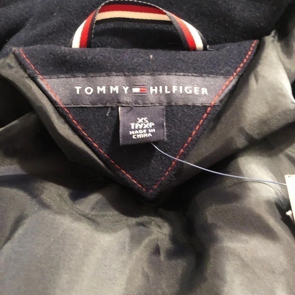 Tommy Hilfiger buttons up