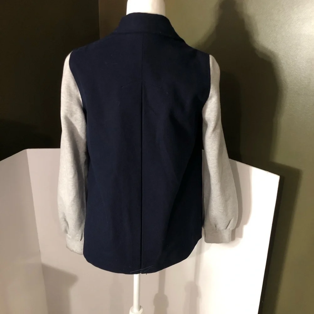 Tommy Hilfiger buttons up