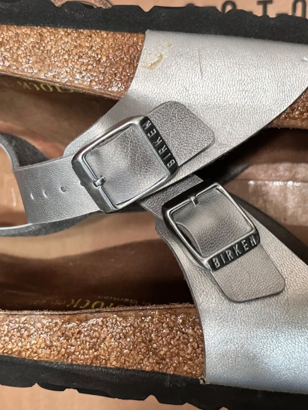 Birkenstock Gizeh thong sandals in silver, featuring a metallic Birko-Flor upper