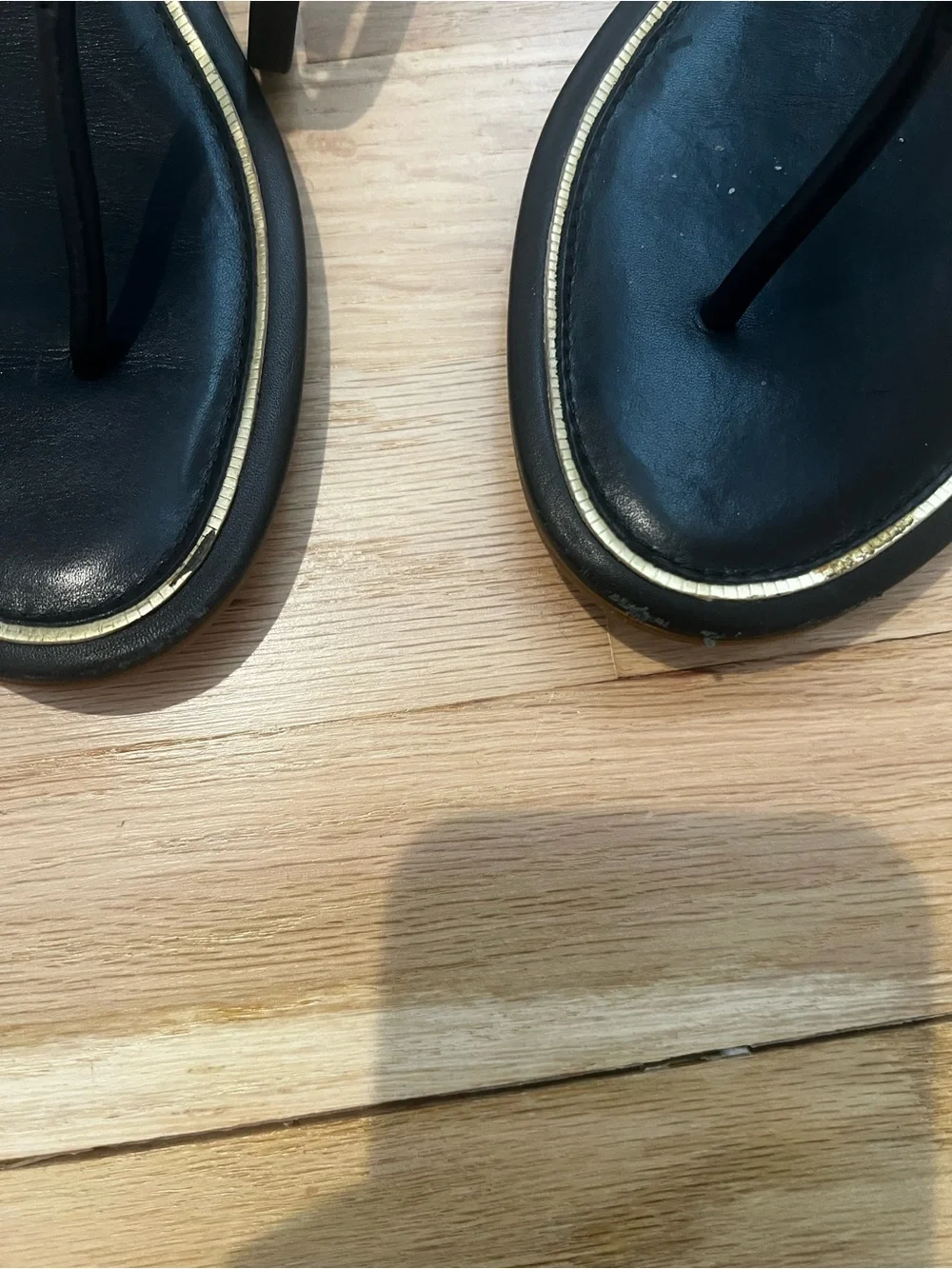 Tory Burch Black Leather Thong Sandals with Gold Logo Accent