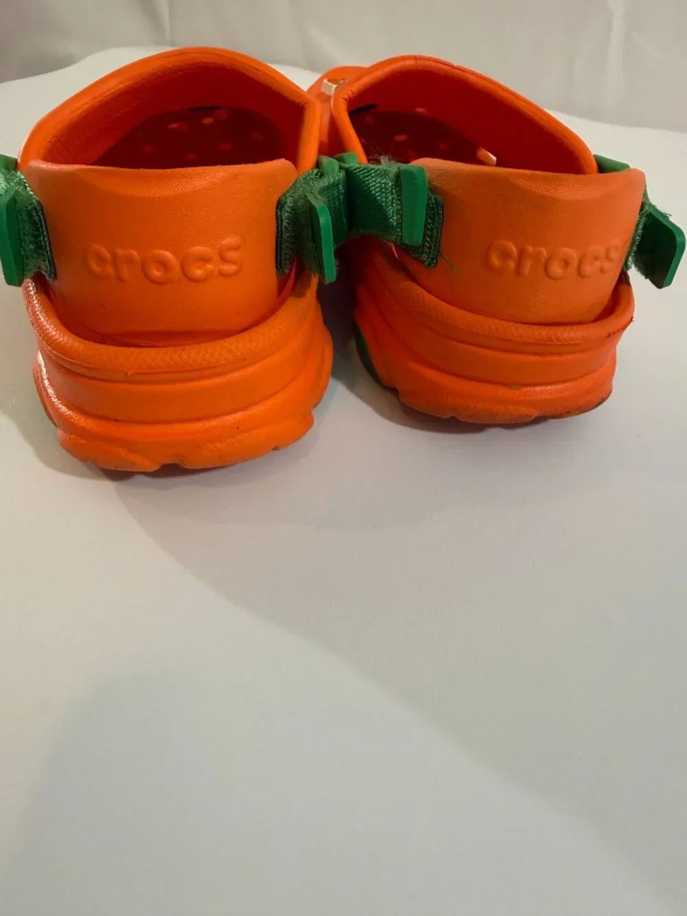 Crocs Carrots clogs with green straps & Croc charms size 1 Junior- gently used