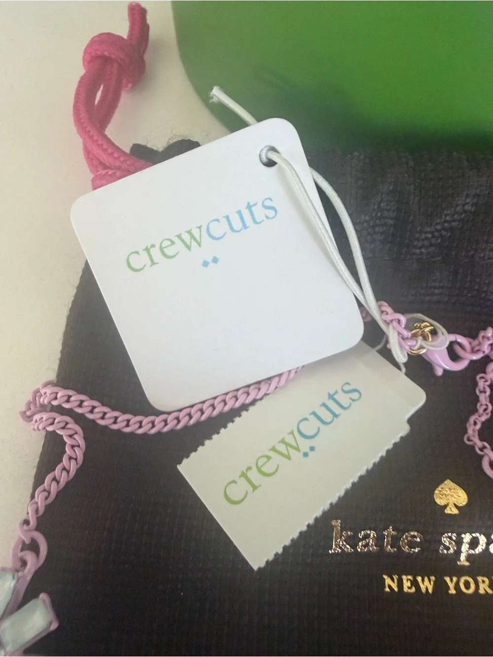 kate spade pink chain charm necklace with gold logo detail
