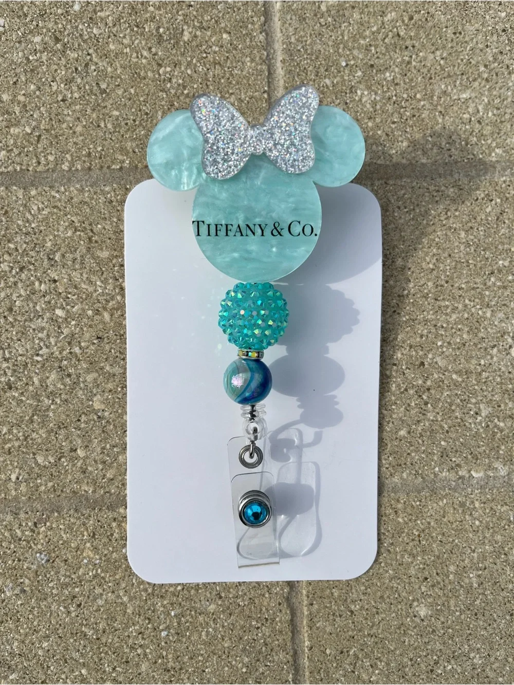Hand Crafted Inspired Turquoise Character Badge Reel with Sparkle Bow