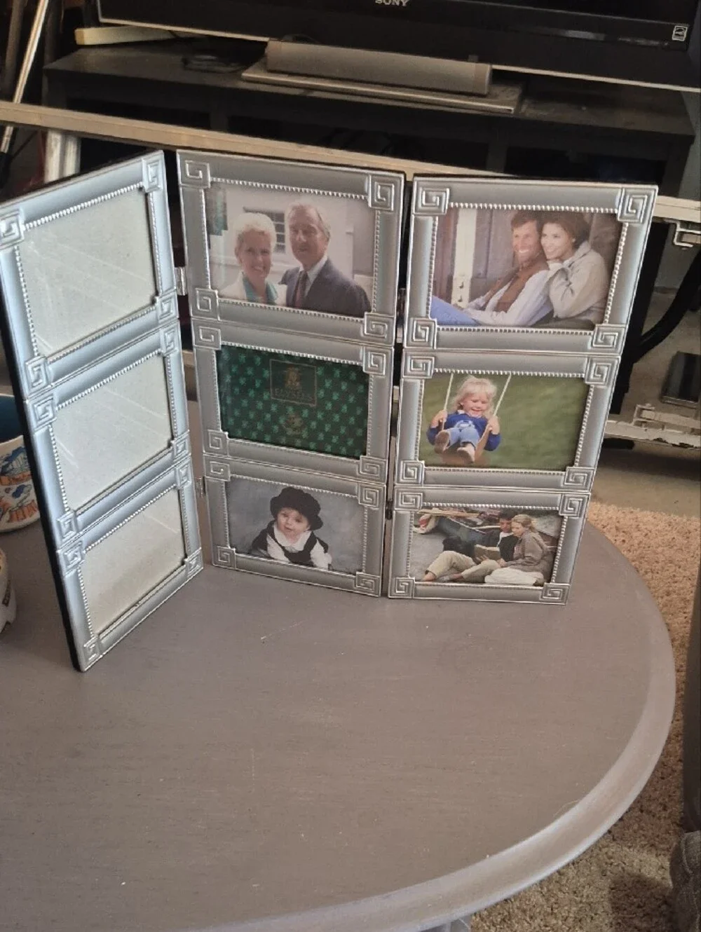 Silver 9-Window Folding Photo Frame Display