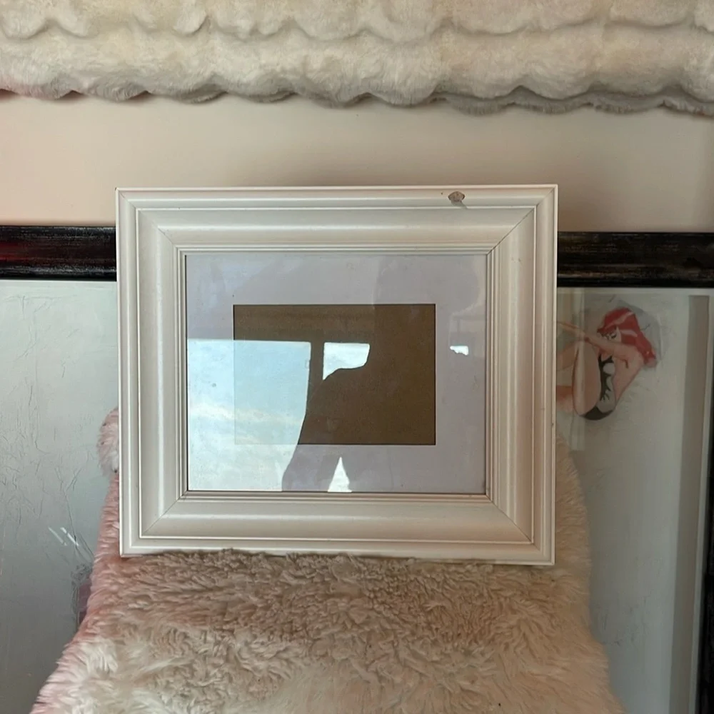 White frame not new had some paint section that was removed can be repaired