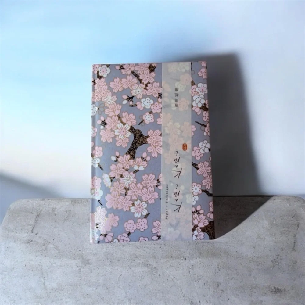 Japanese  notebook or journal featuring a cherry blossom (Sakura) pattern