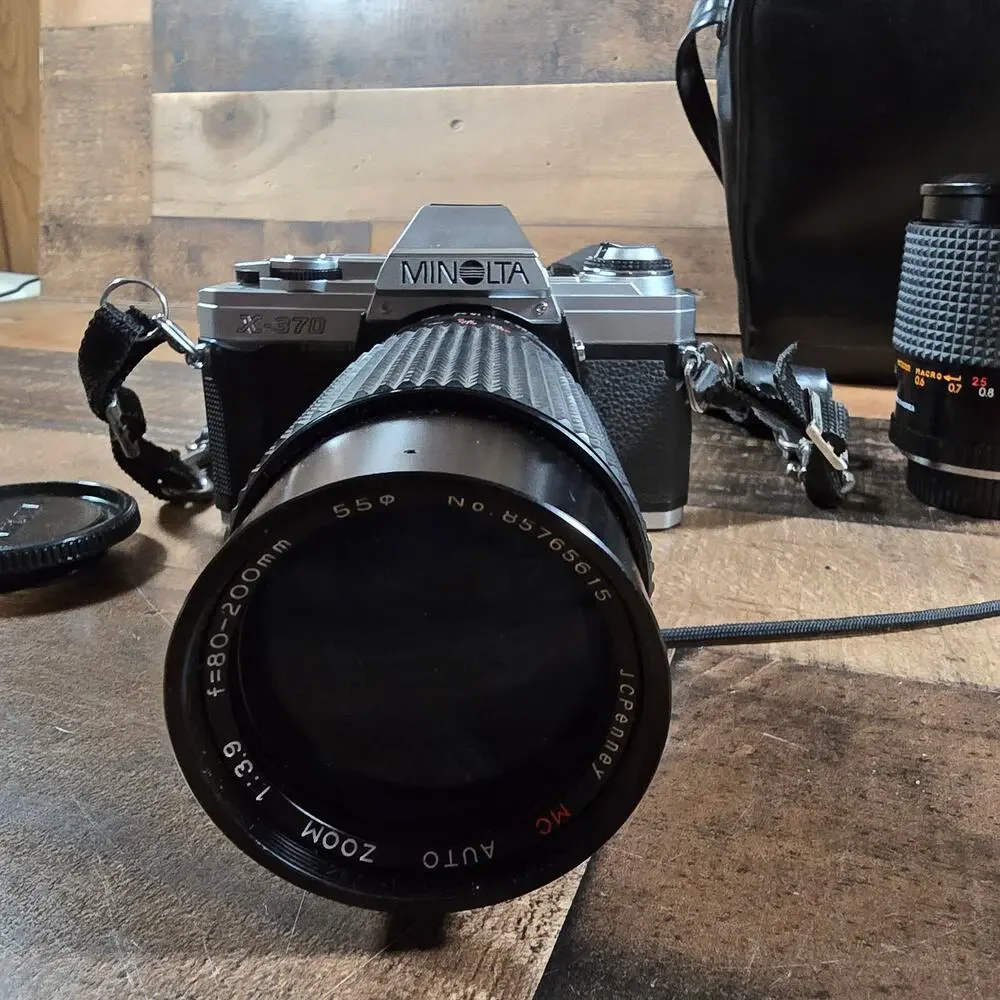 Minolta X370 with a JC Penny f=80 to 200mm zoom lens and prospect f=28-70mm lens
