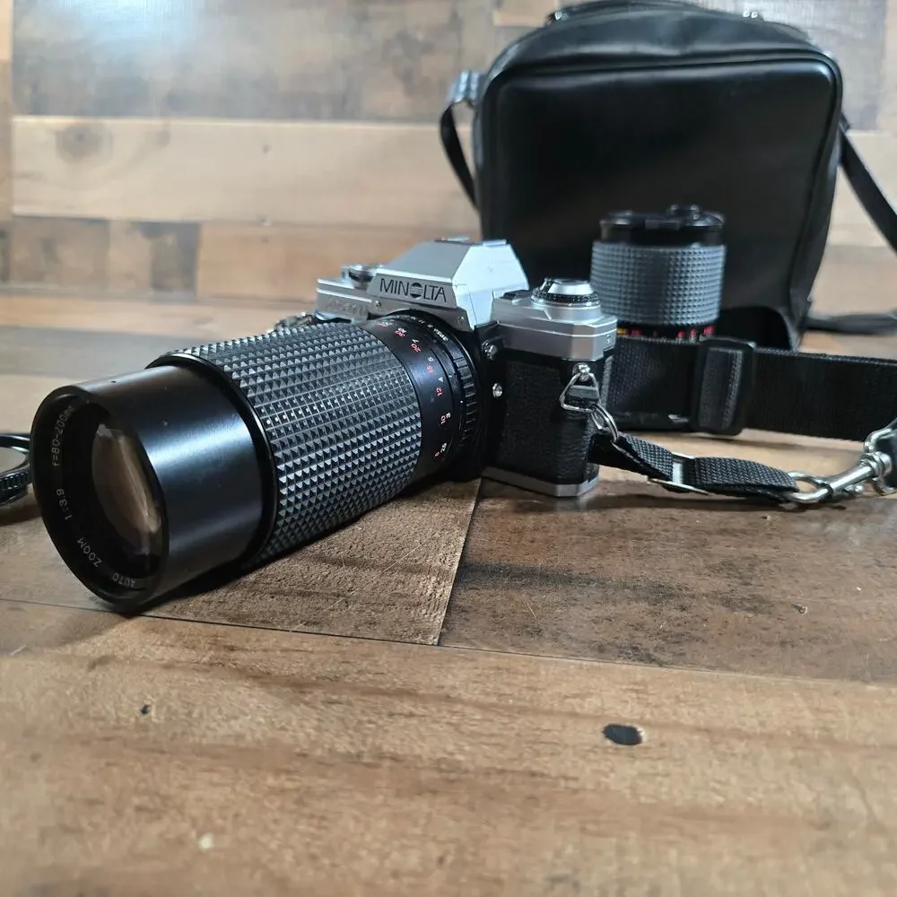 Minolta X370 with a JC Penny f=80 to 200mm zoom lens and prospect f=28-70mm lens