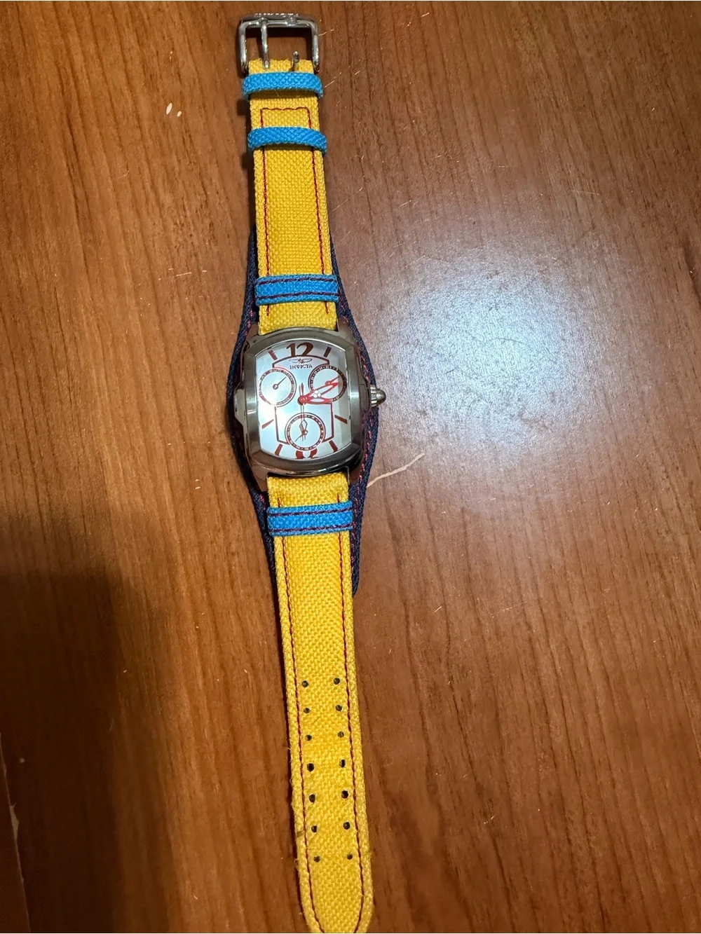 Invicta Yellow and Blue Women's Fabric Strap Watch with Silver Dial