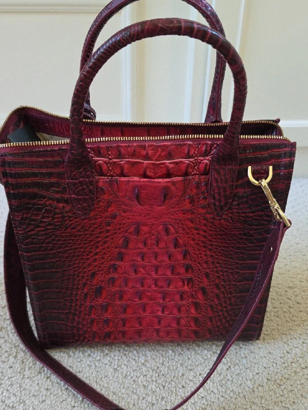 Brahmin embossed refined polished