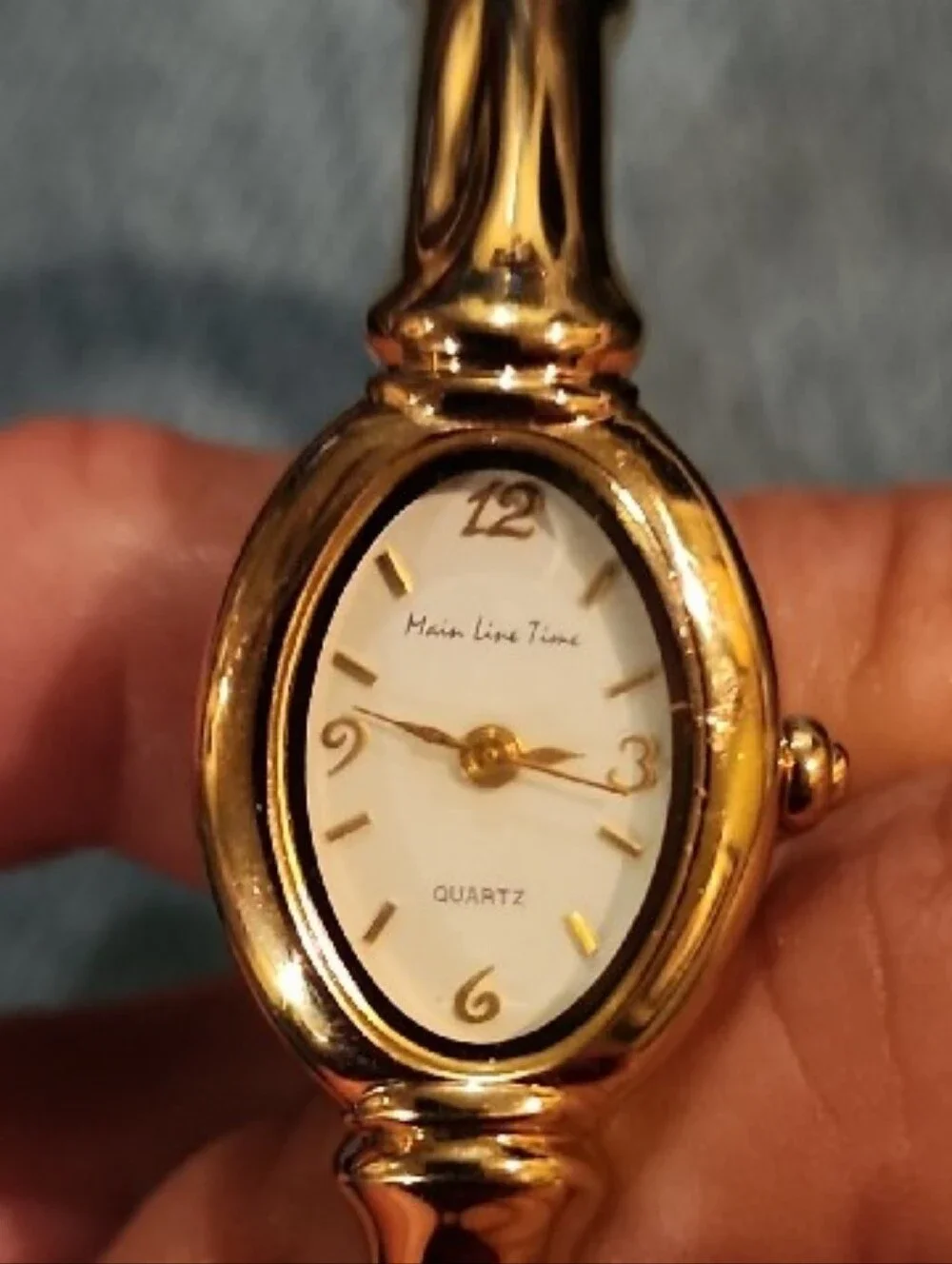 Main Line gold toned