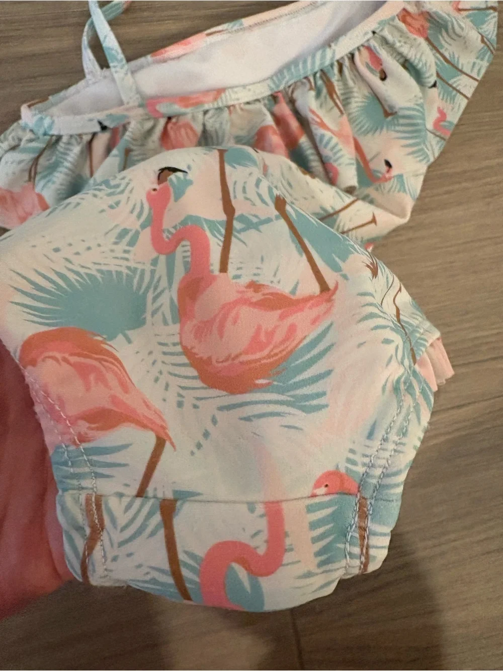 Ruffle Butts one shoulder