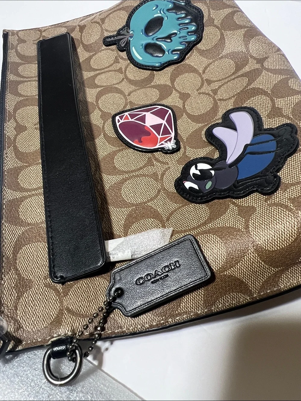 Coach Brown Monogram Wristlet with Enamel Patches