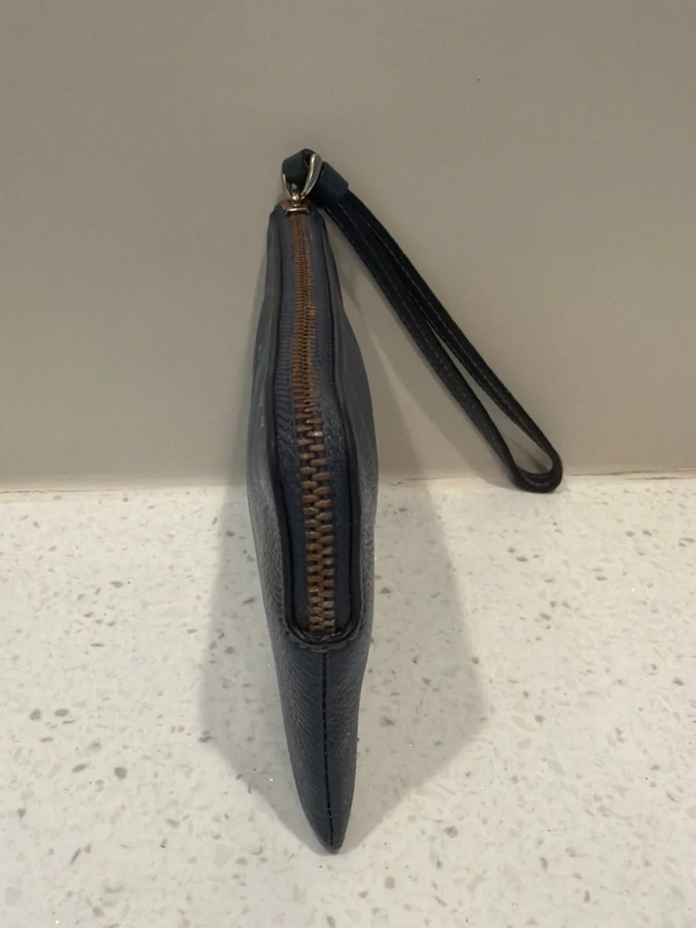 Coach Navy Leather Wristlet with Bronze Hardware