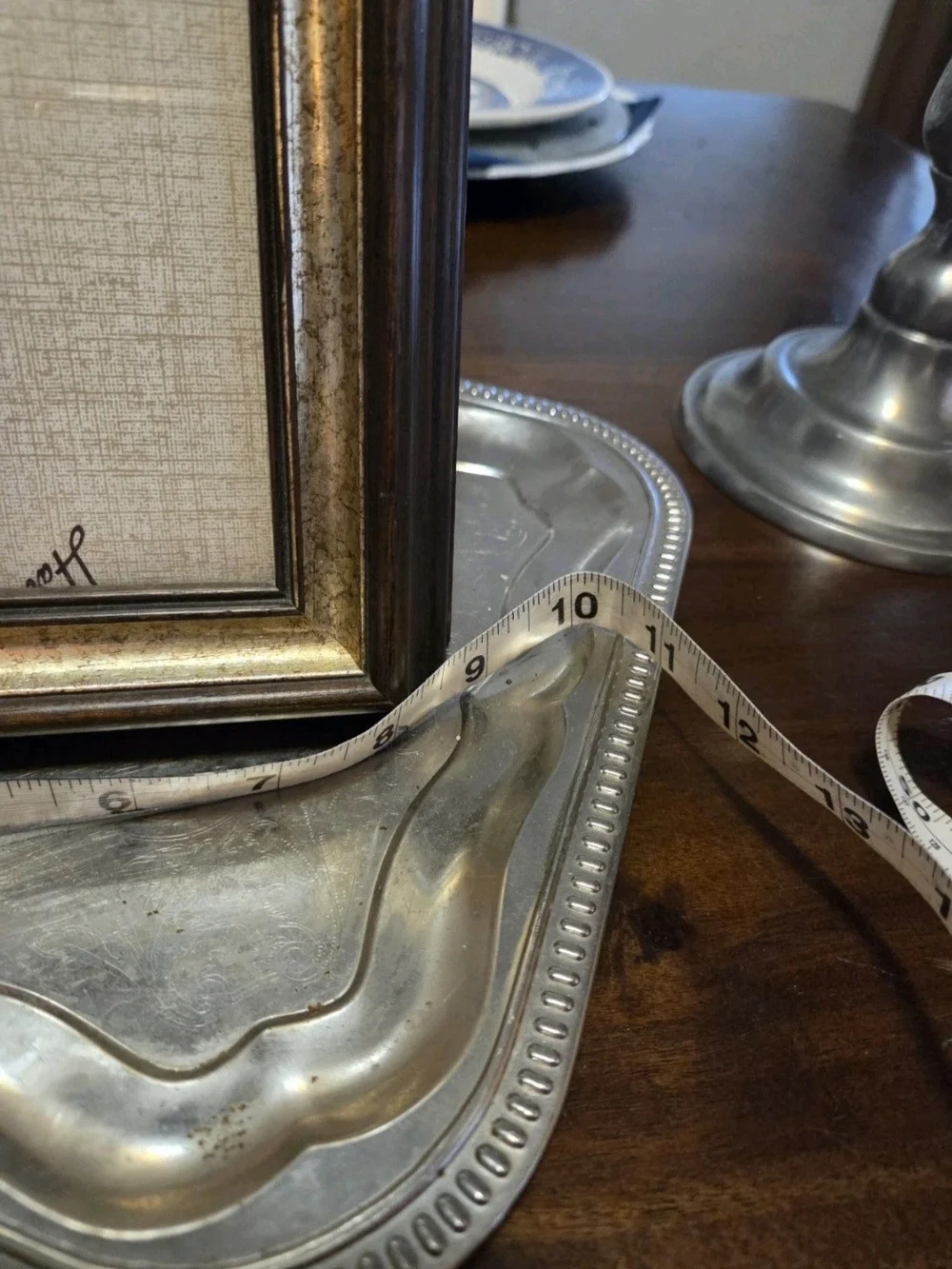 Vintage Hartcraft picture frame features a traditional brown wood finish