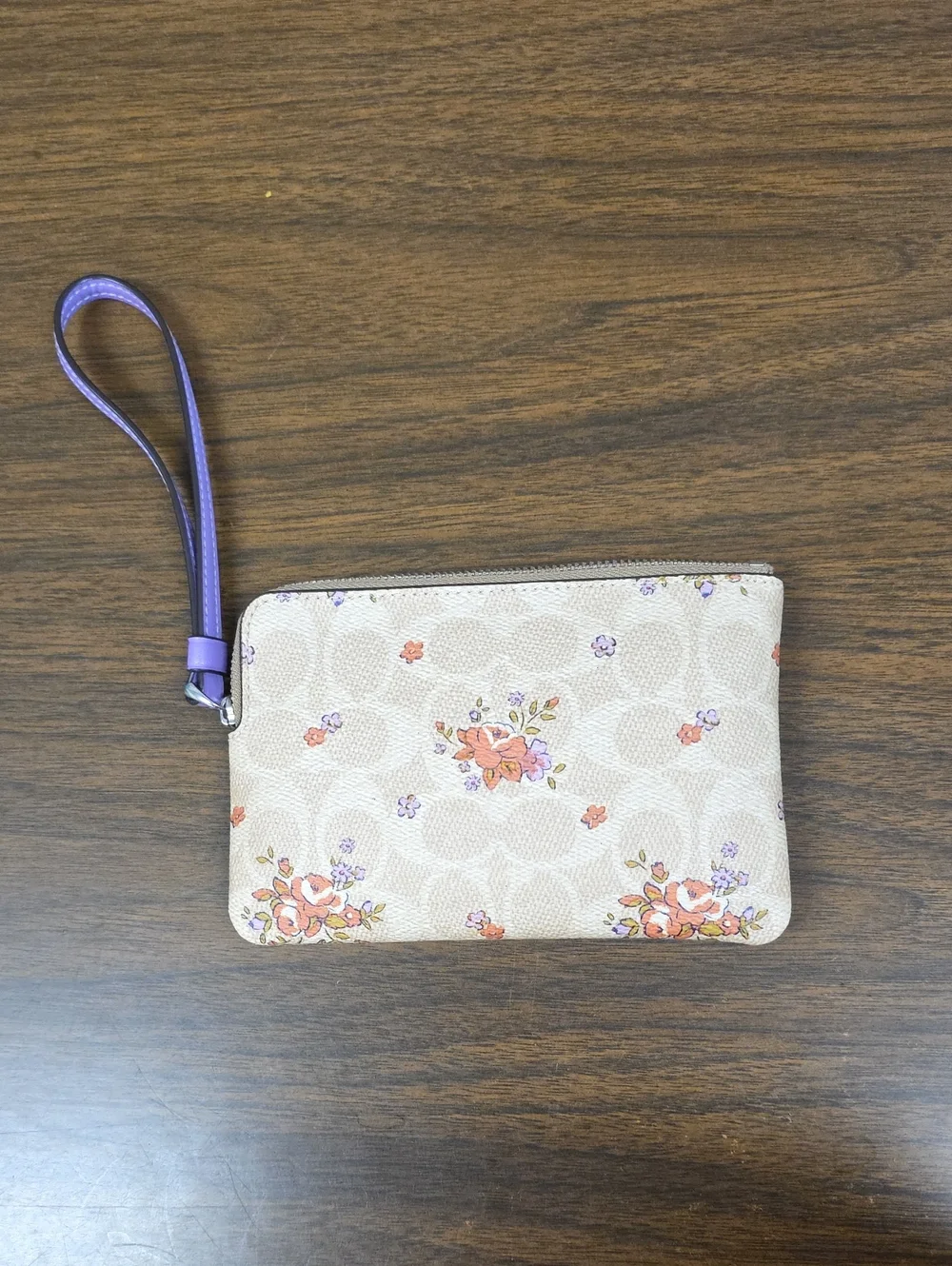 COACH FLORAL WRISTLET NO HANGTAG