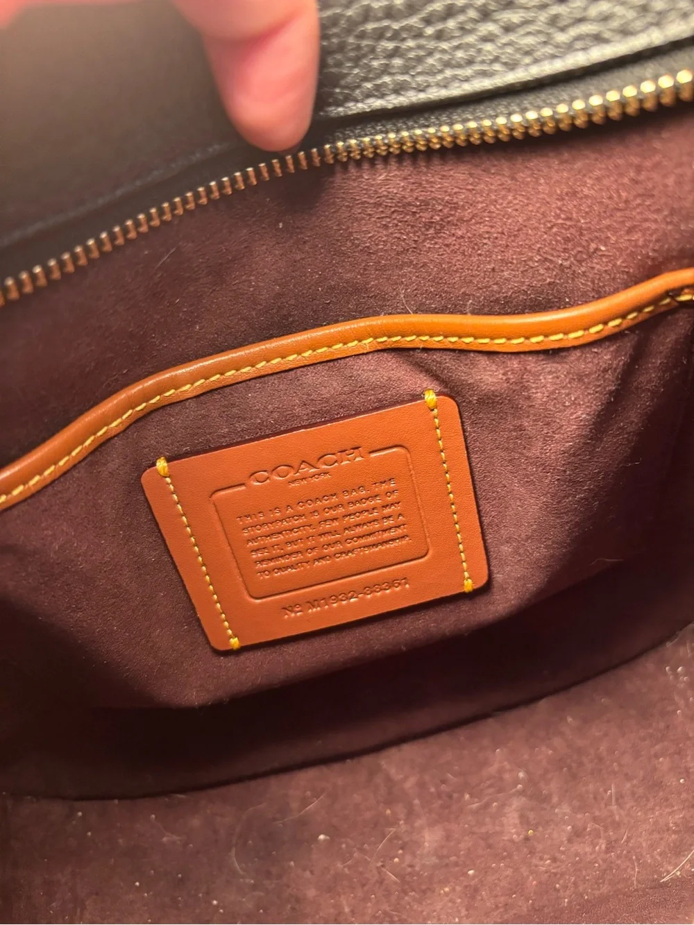 Coach brass designer carry