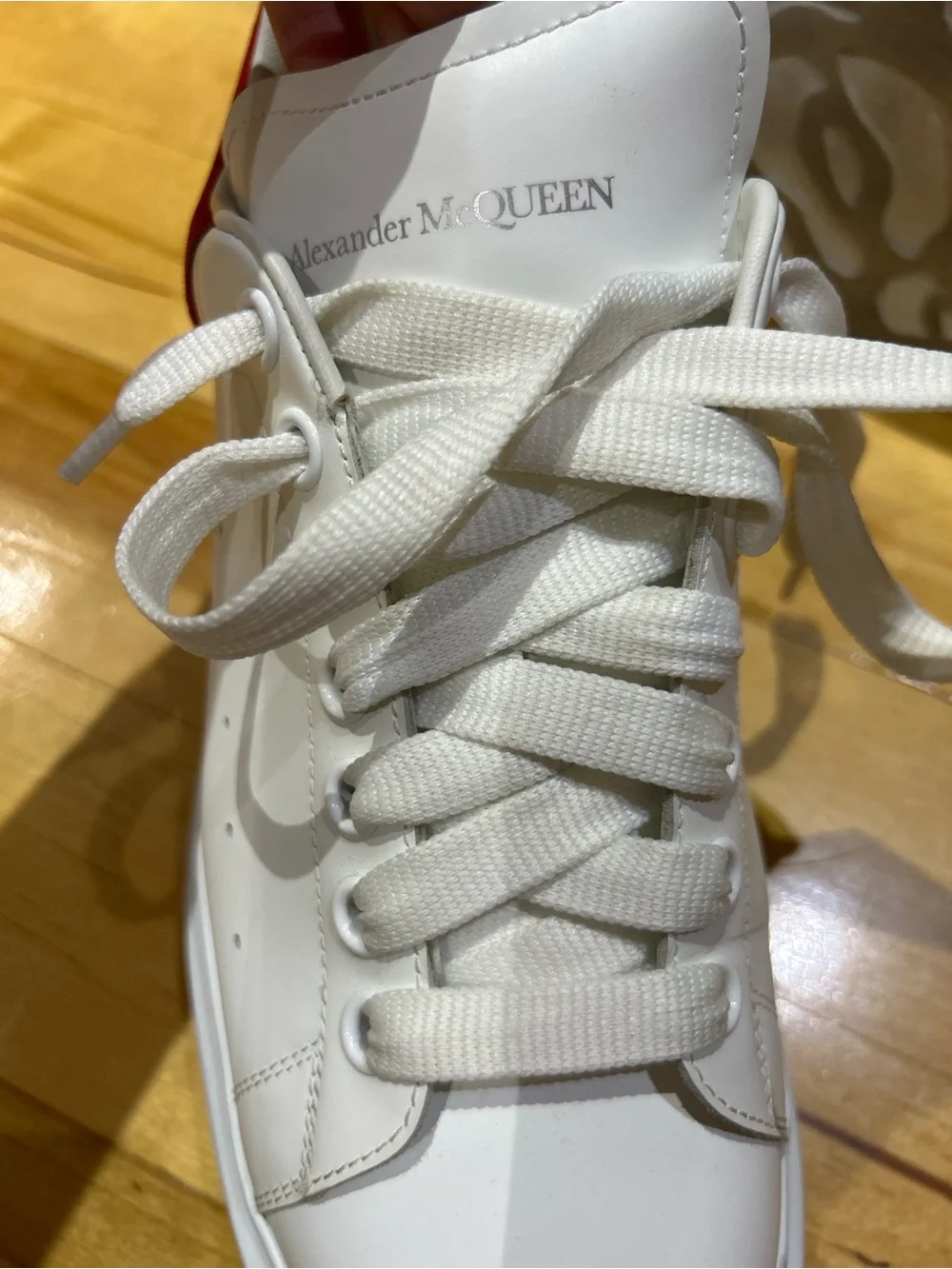 Alexander McQueen White Leather Sneakers with Red Heel Tab