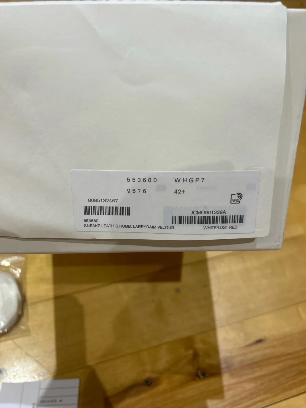Alexander McQueen White Leather Sneakers with Red Heel Tab