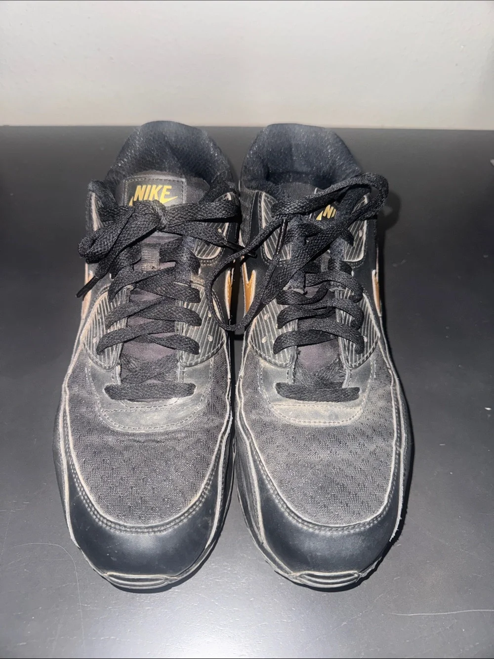 Nike Men's Black Sneakers with Gold Swoosh