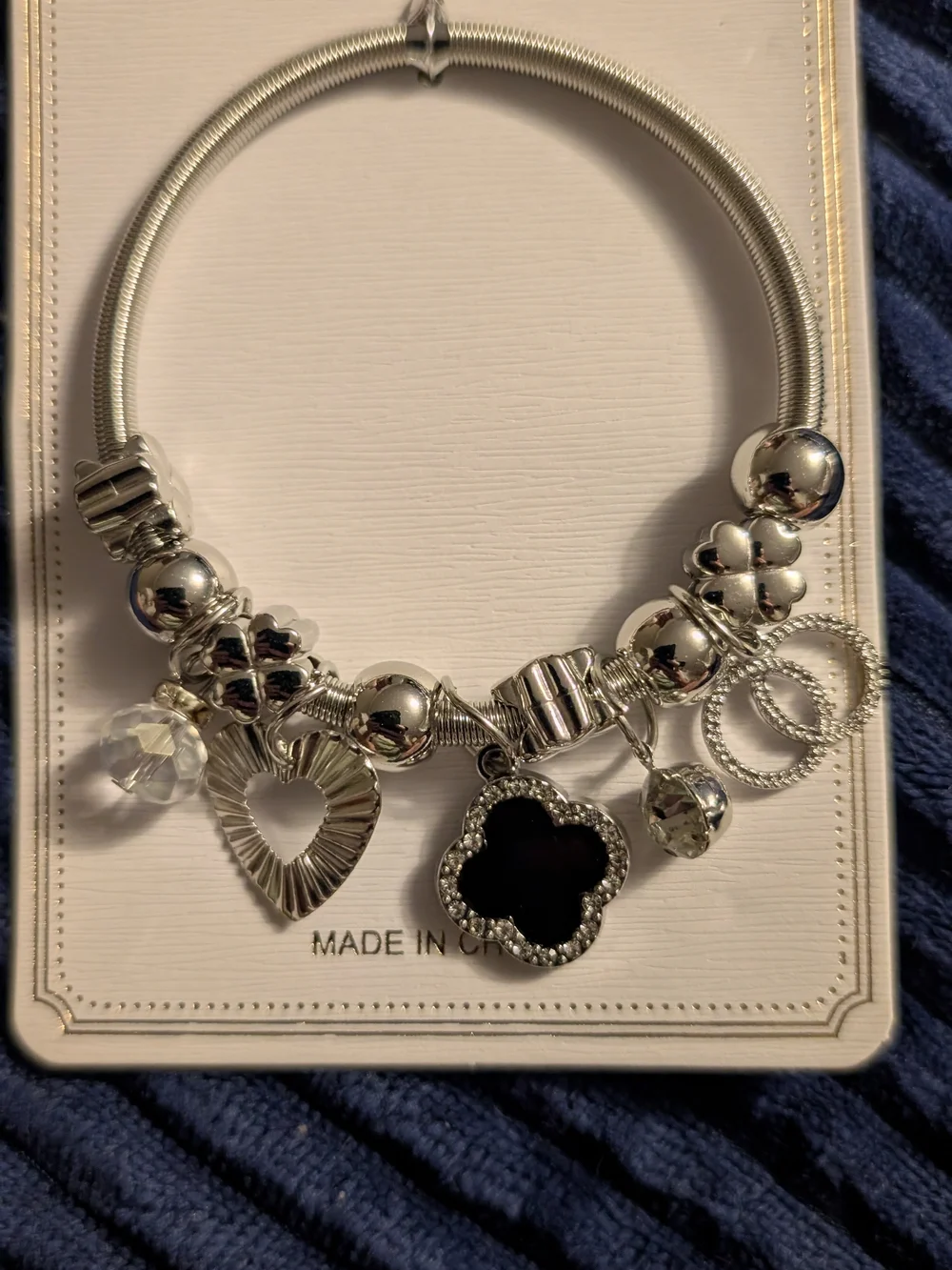 Silver Charm Bracelet with Black Clover Pendant