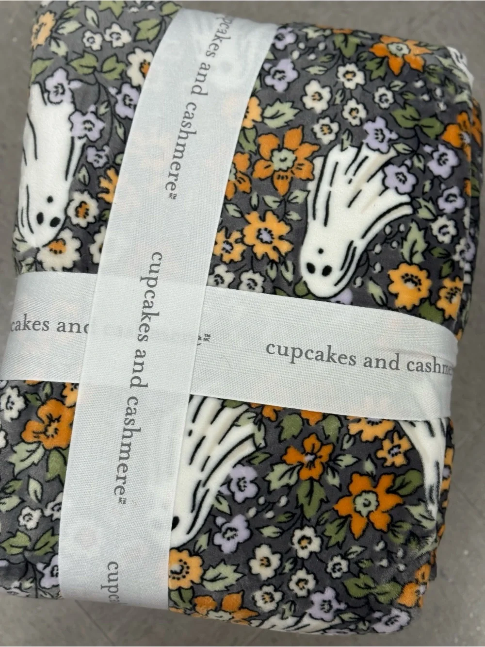 cupcakes & cashmere Gray Blanket with Orange and White Floral Ghosts