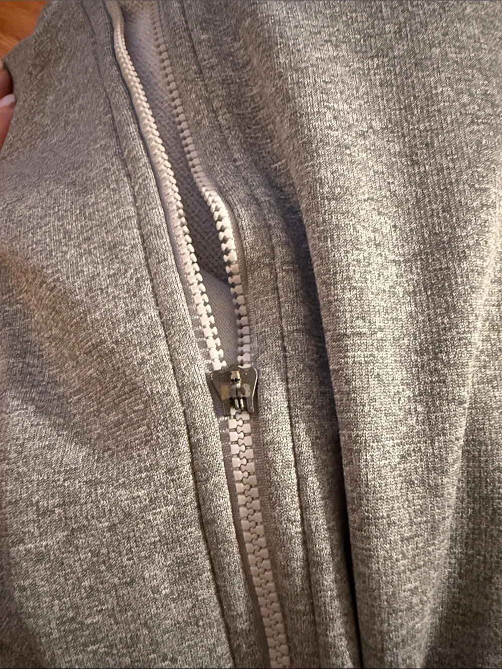 The North Face Light Gray Full-Zip Jacket with Orange Logo Accent