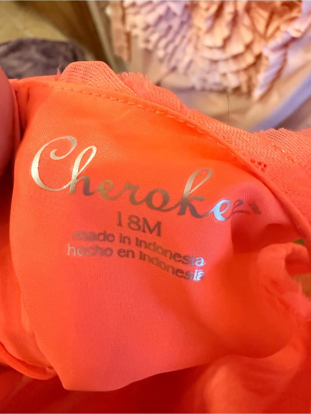 Cherokee sleeveless rosette