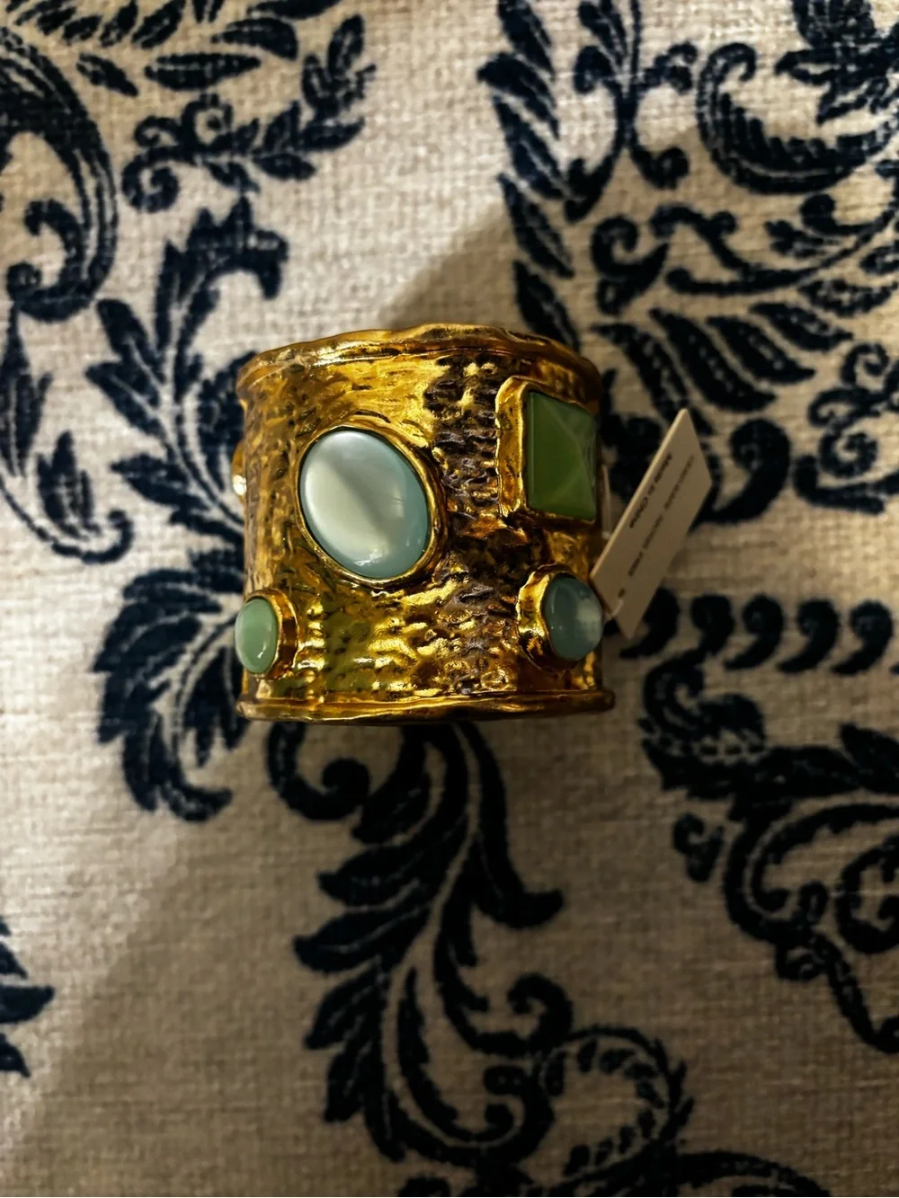 Gold Cuff Bracelet with Green Gem Accents