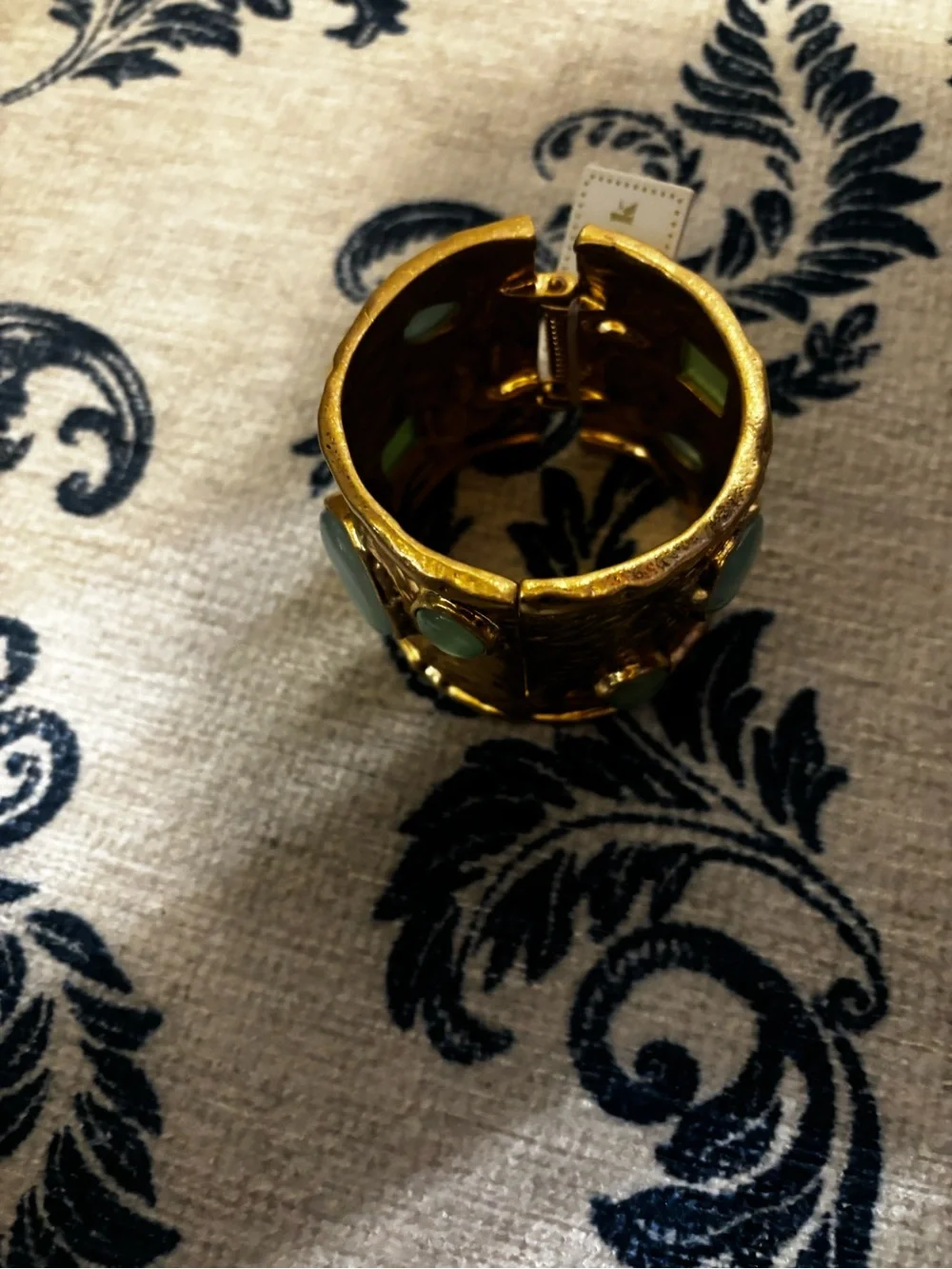 Gold Cuff Bracelet with Green Gem Accents