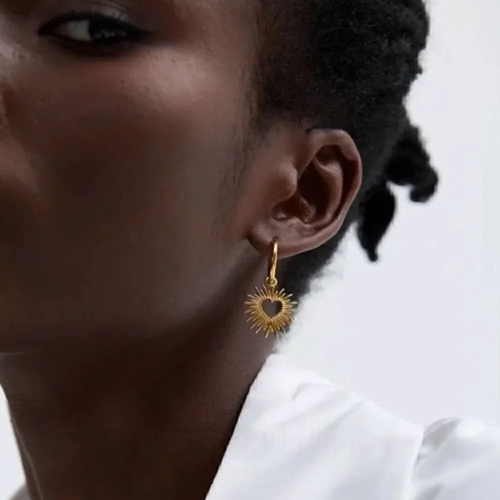 Sun radiant hoop earrings N91