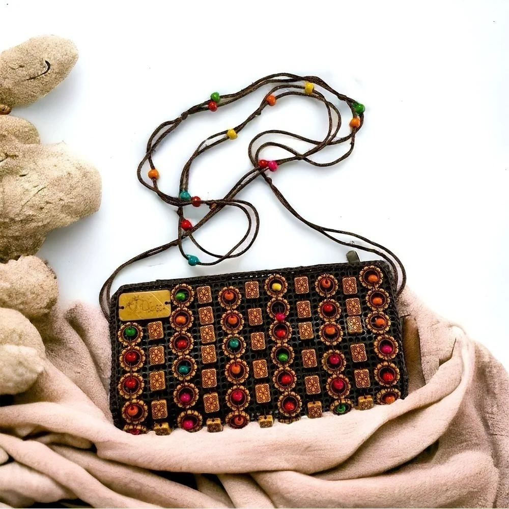 Beats mini sling crossbody bag in beautiful brown color with coconut shell