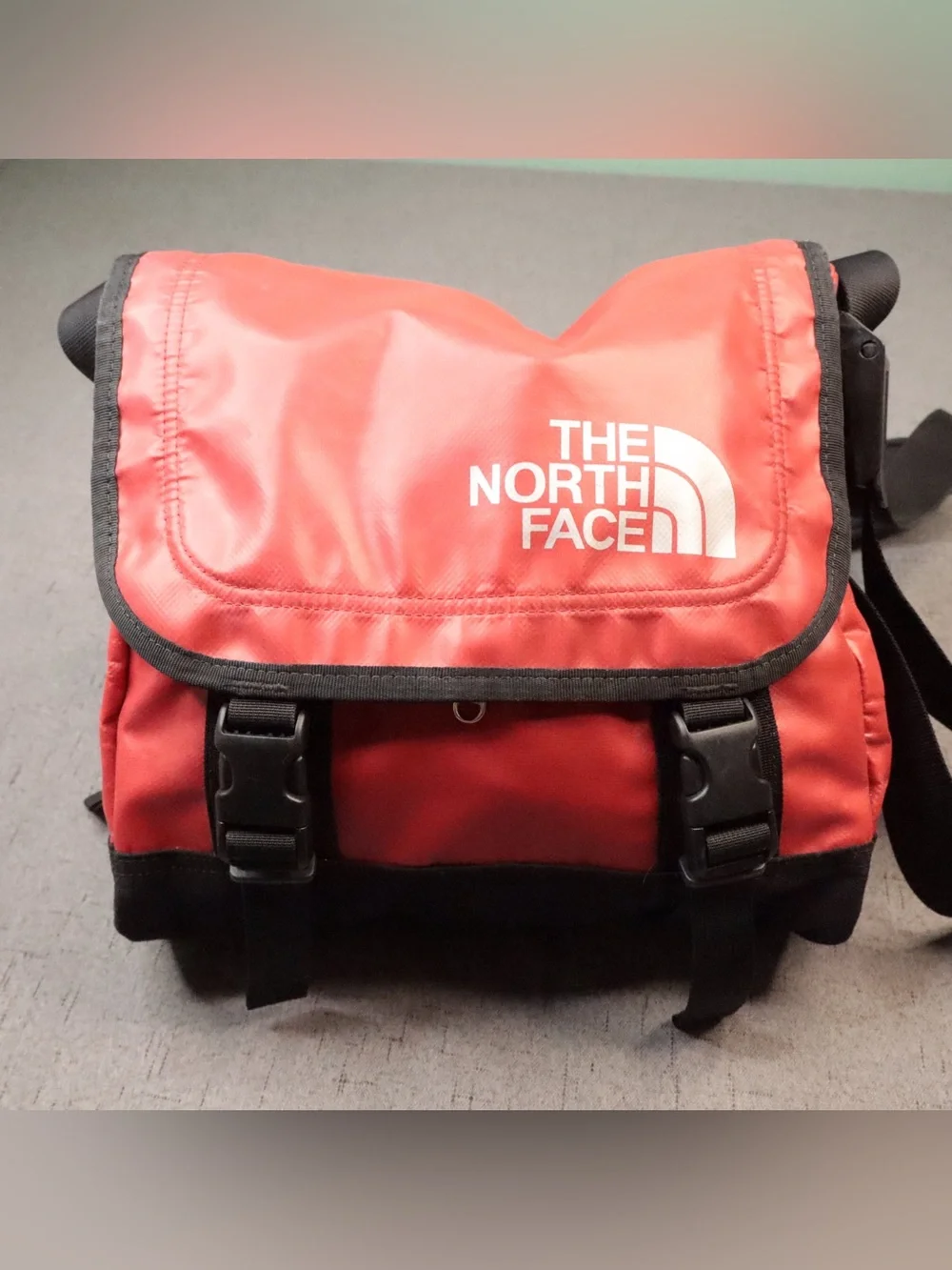 The North Face compact messenger