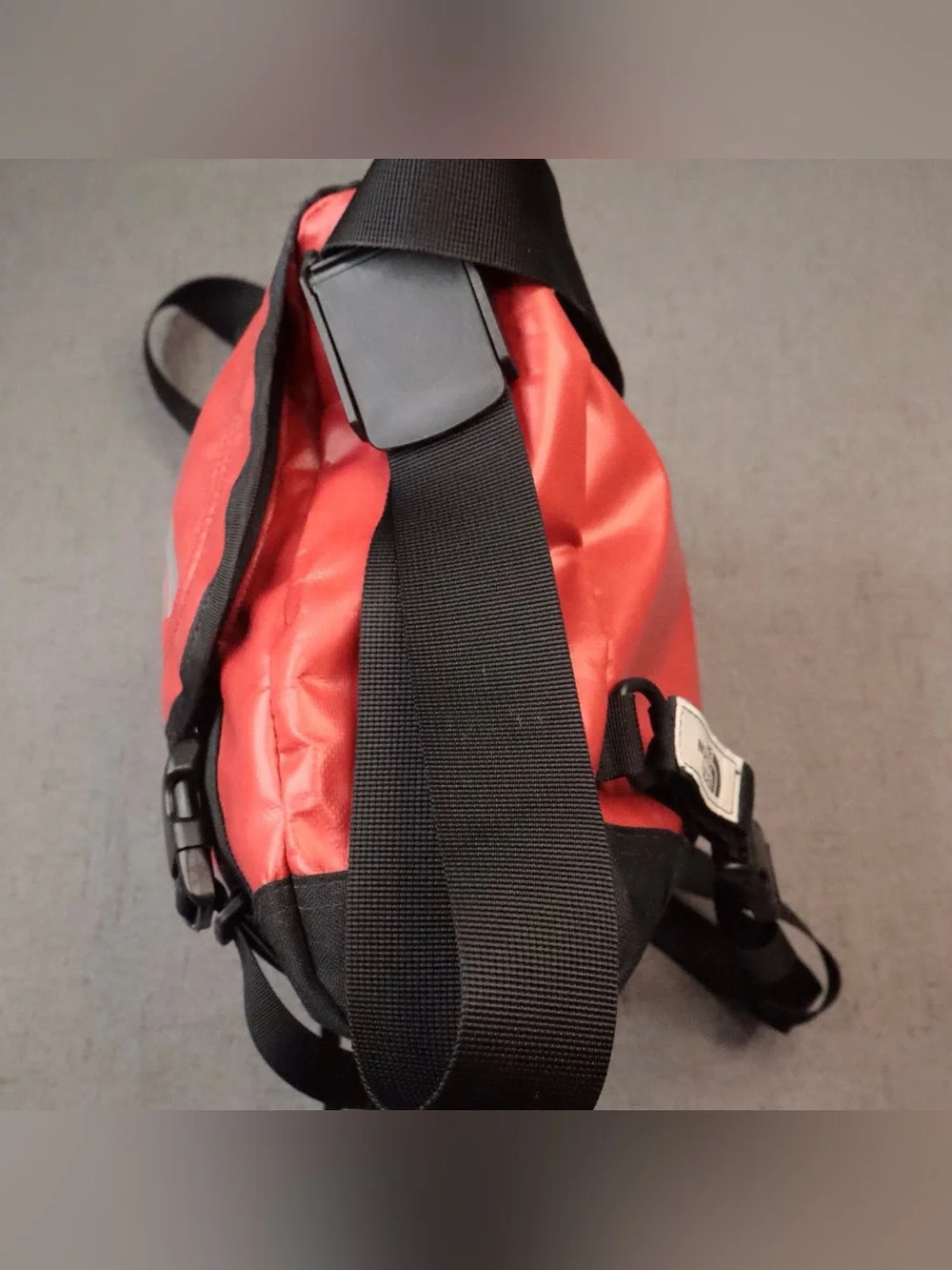 The North Face compact messenger