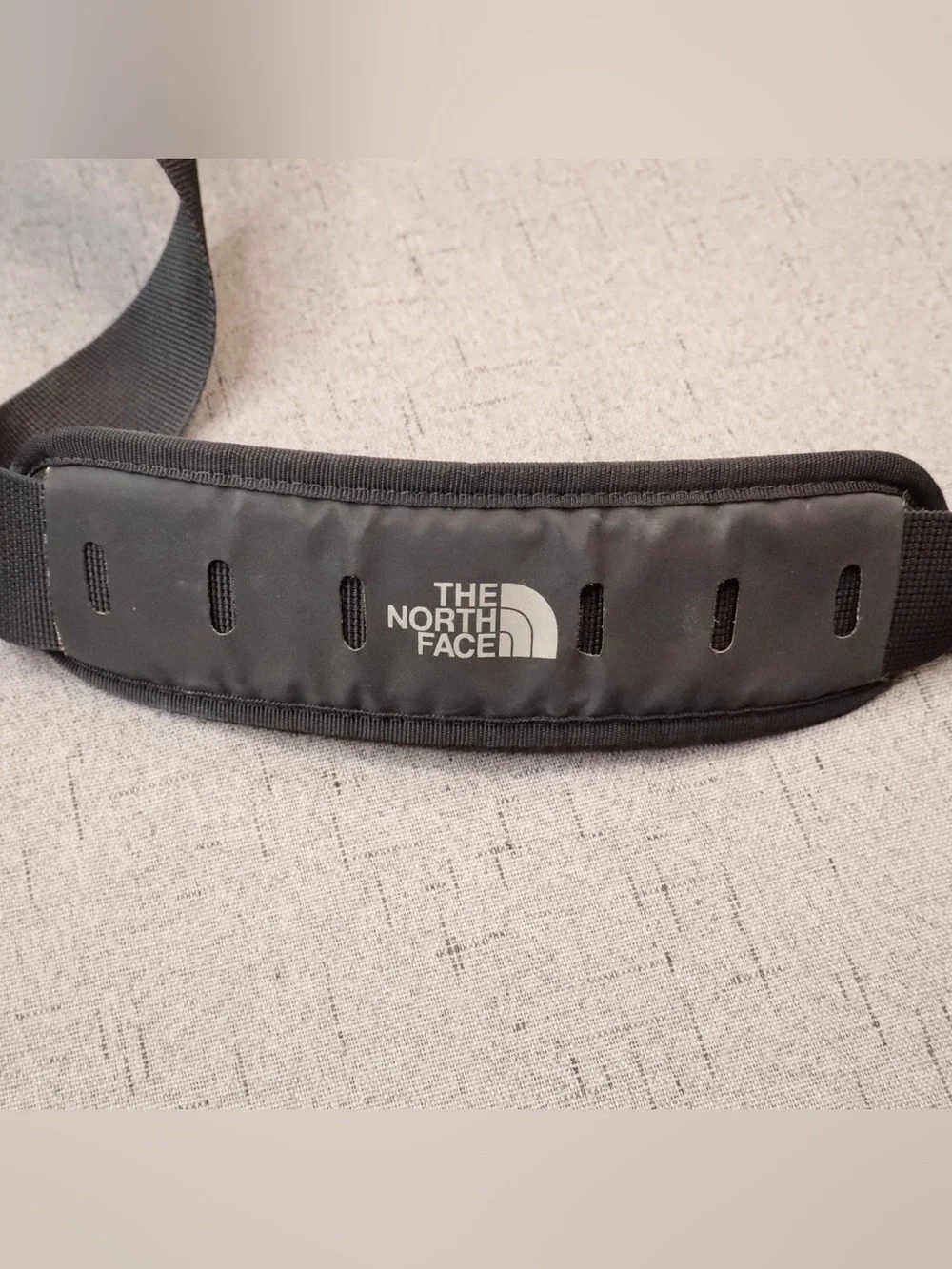 The North Face compact messenger