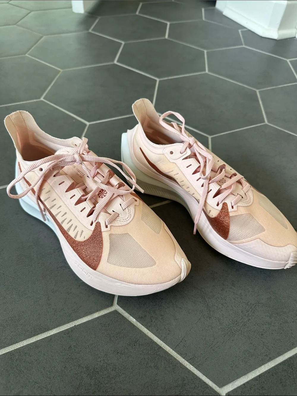 Nike Women's Pink Running Shoes with Rose Metallic Swoosh