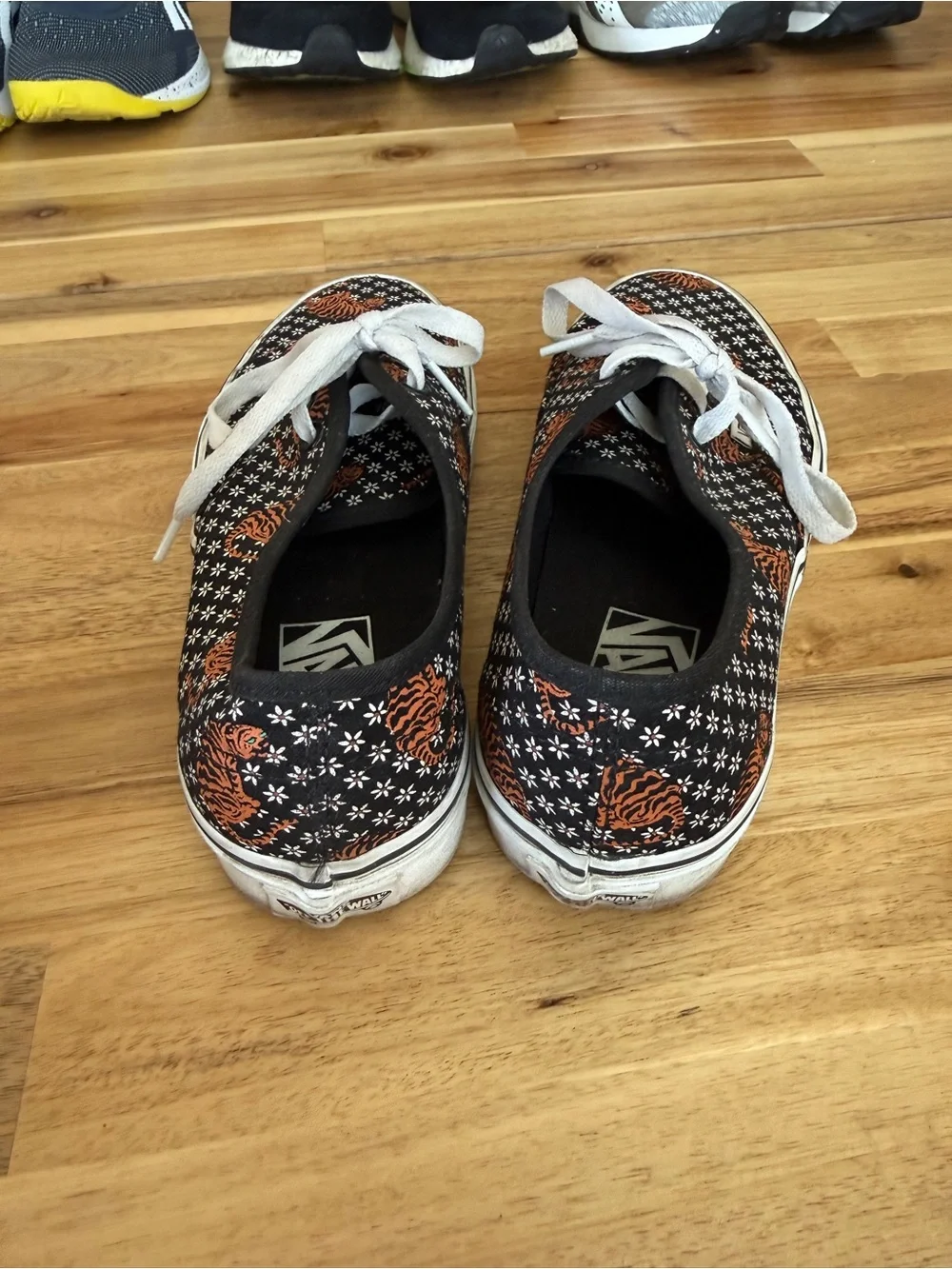 Black womens Lace-Up Canvas Vans with Orange Tiger Print
