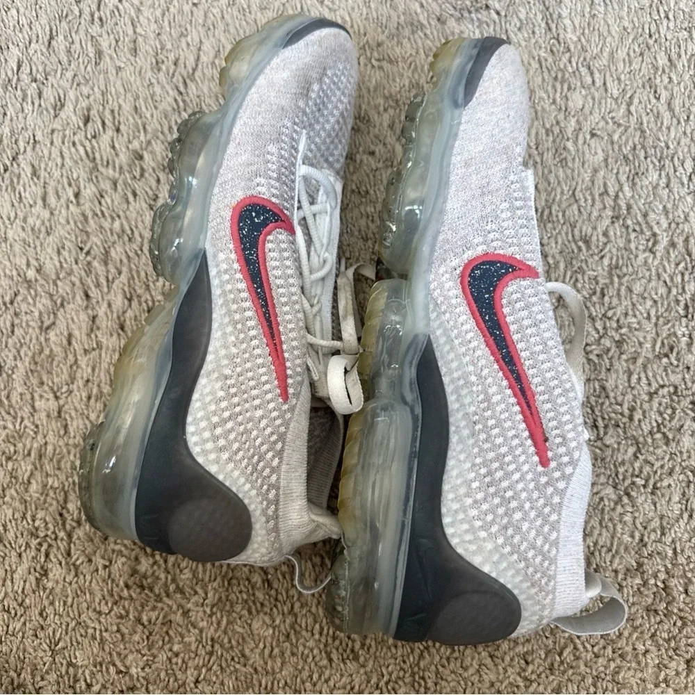 Nike sneakers featuring
