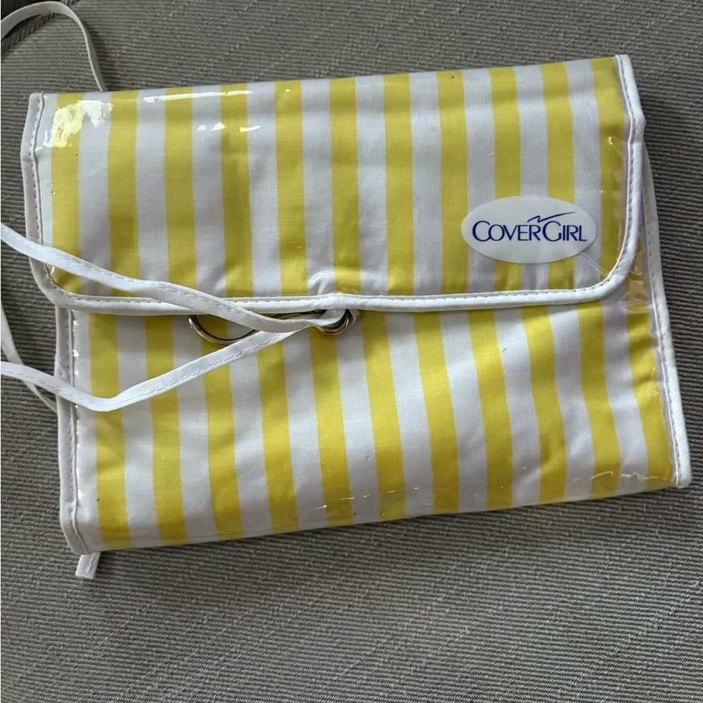 Vintage 1980s Covergirl Hanging Makeup Organizer. White and yellow stripe