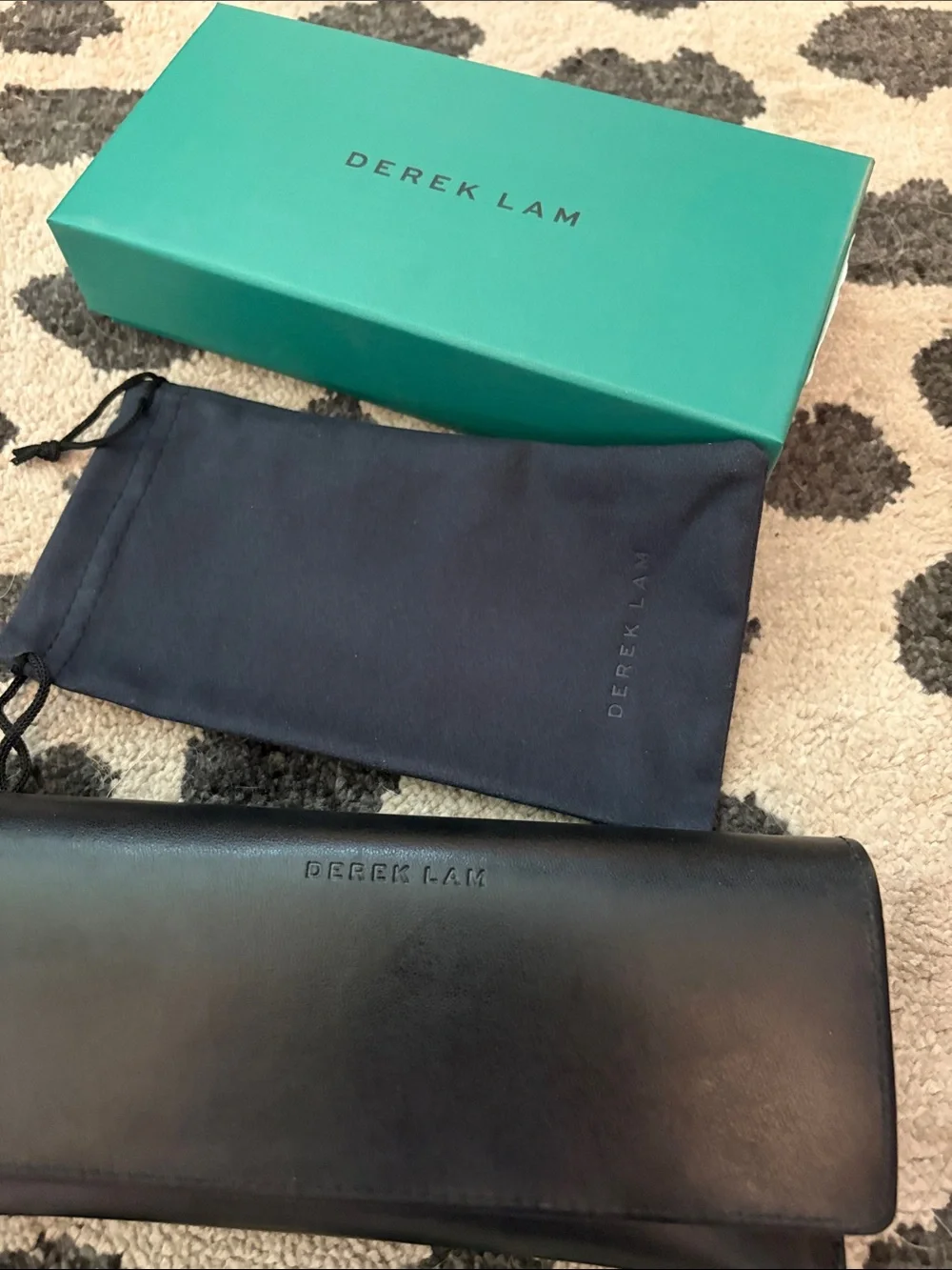 Derek Lam Amber Orange Sunglasses with Black Case