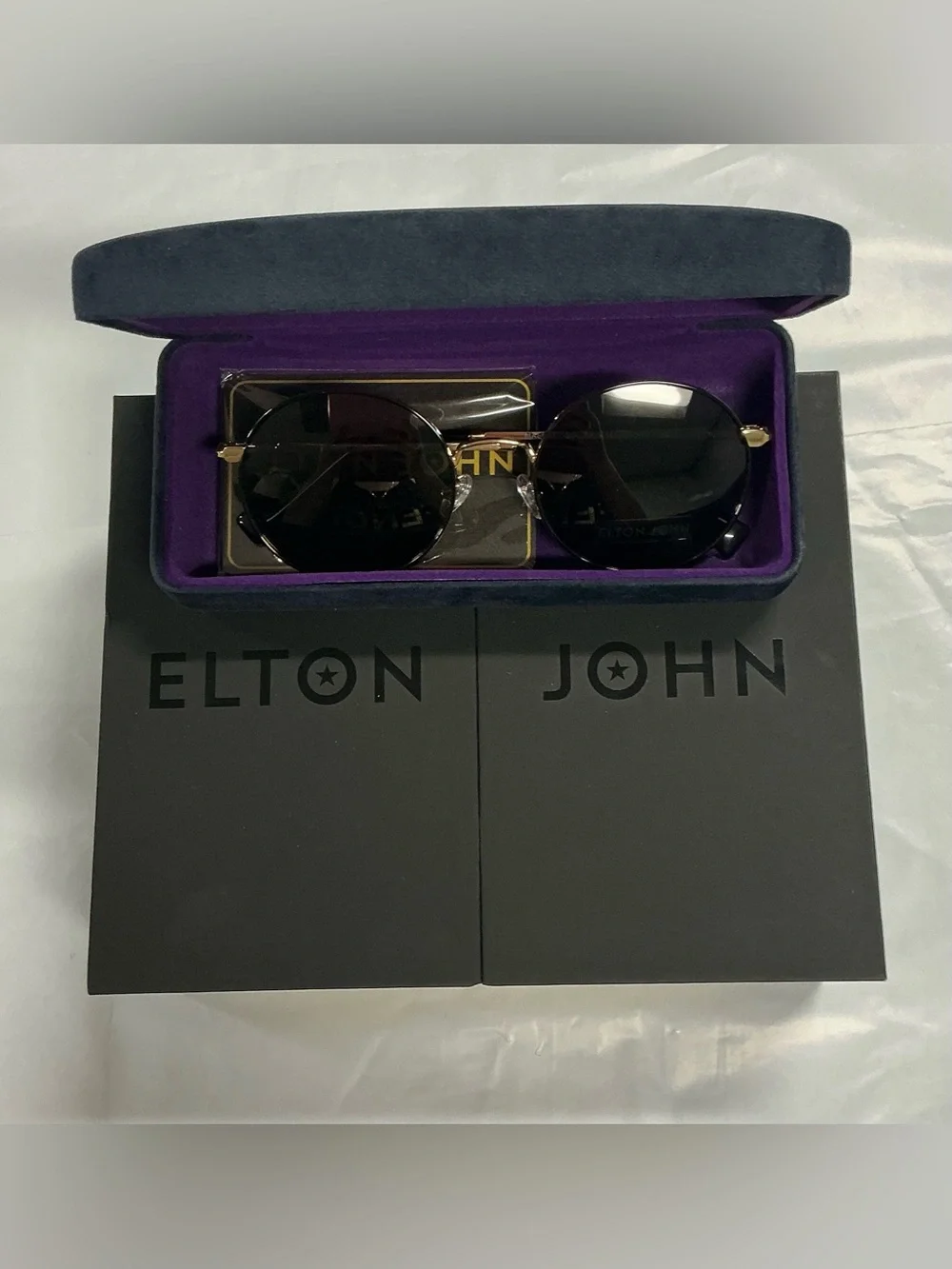 Elton John stylish round