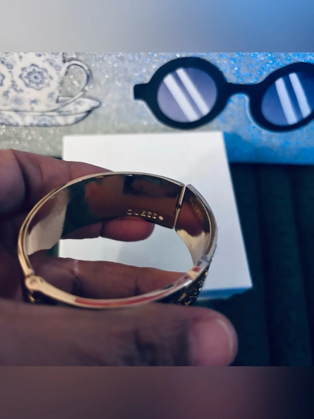 Guess Leopard Print Logo Cuff Bracelet in Gold
