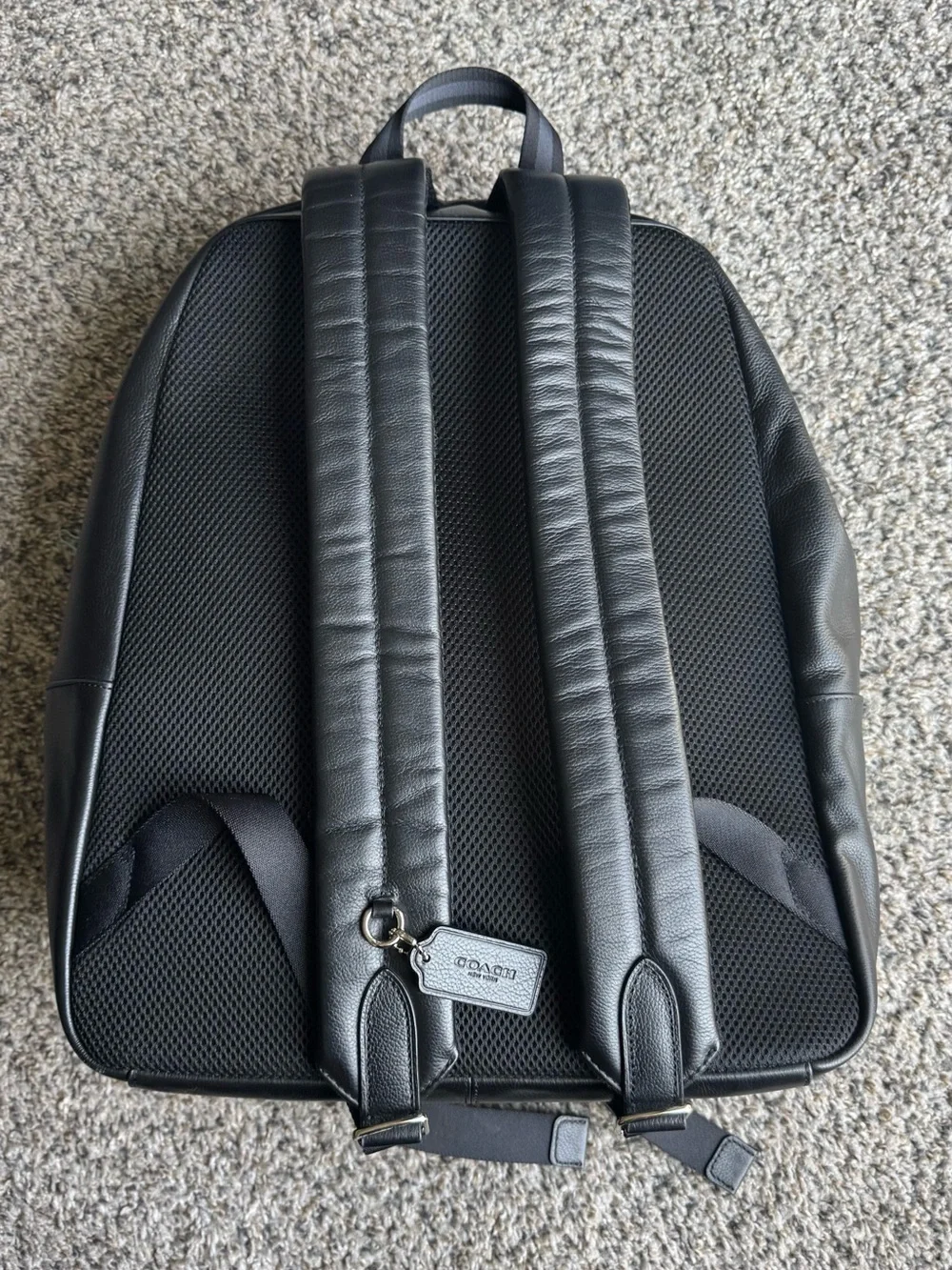 Coach sleek black