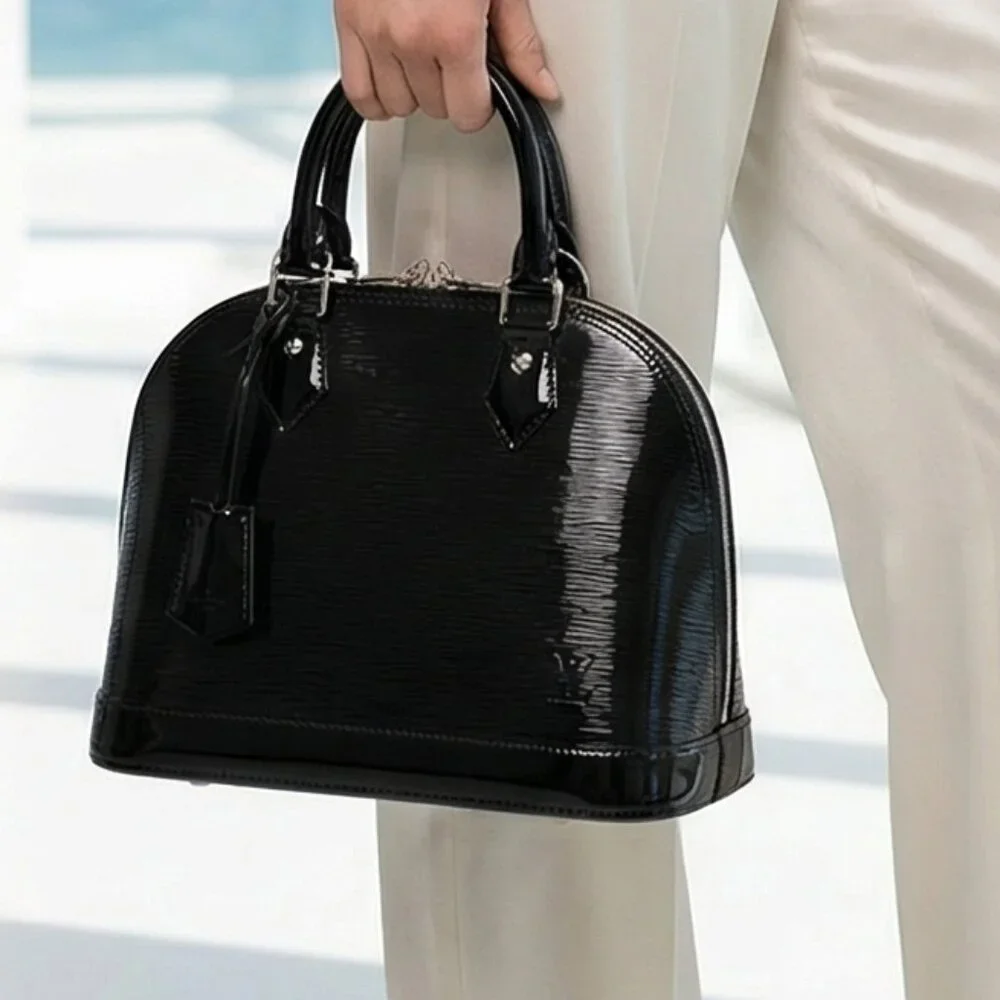 authentic $2850 Louis Vuitton Epi Electric Alma PM Satchel black patent leather