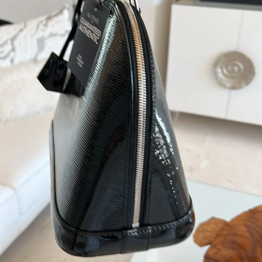 Louis Vuitton alma satchel