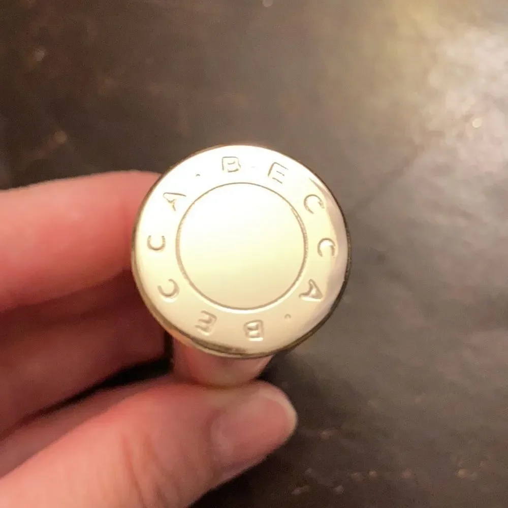 BECCA orange olive high