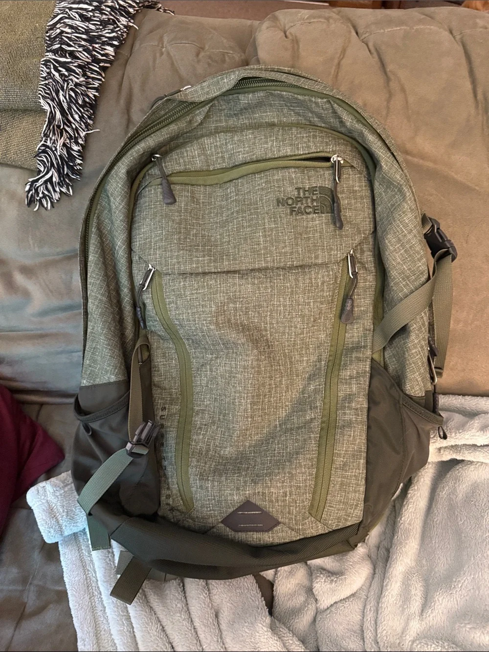 The North Face Men's Olive/Cargo Green Backpack with Multiple Pockets
